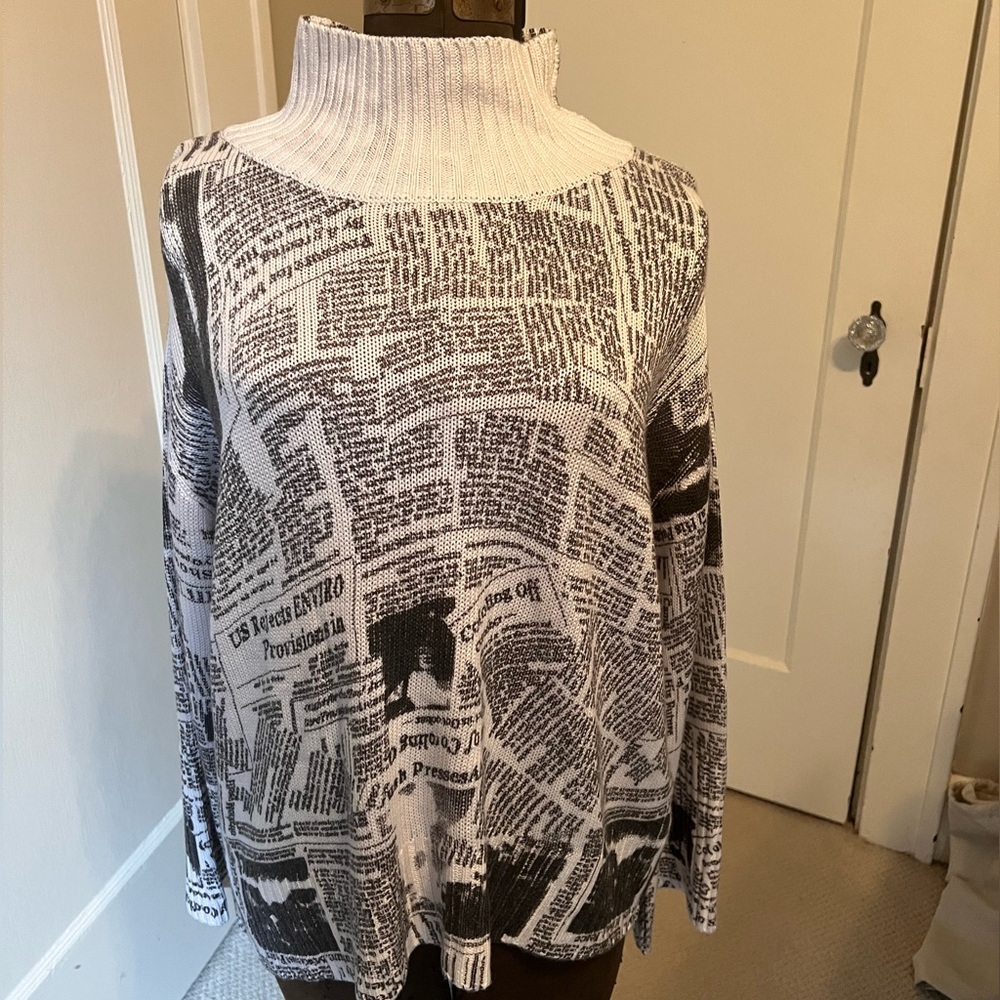 Mock neck sweater in newsprint motif